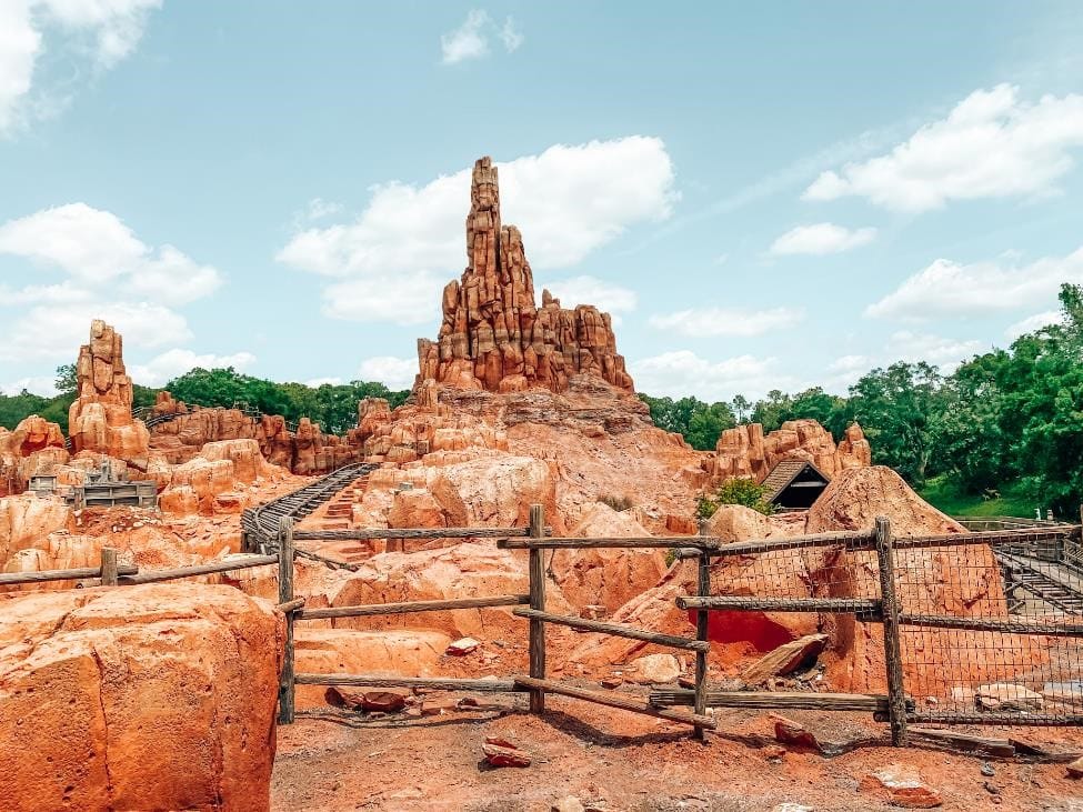 big thunder mountain railroad ride that looks like the red rocks of a mountain