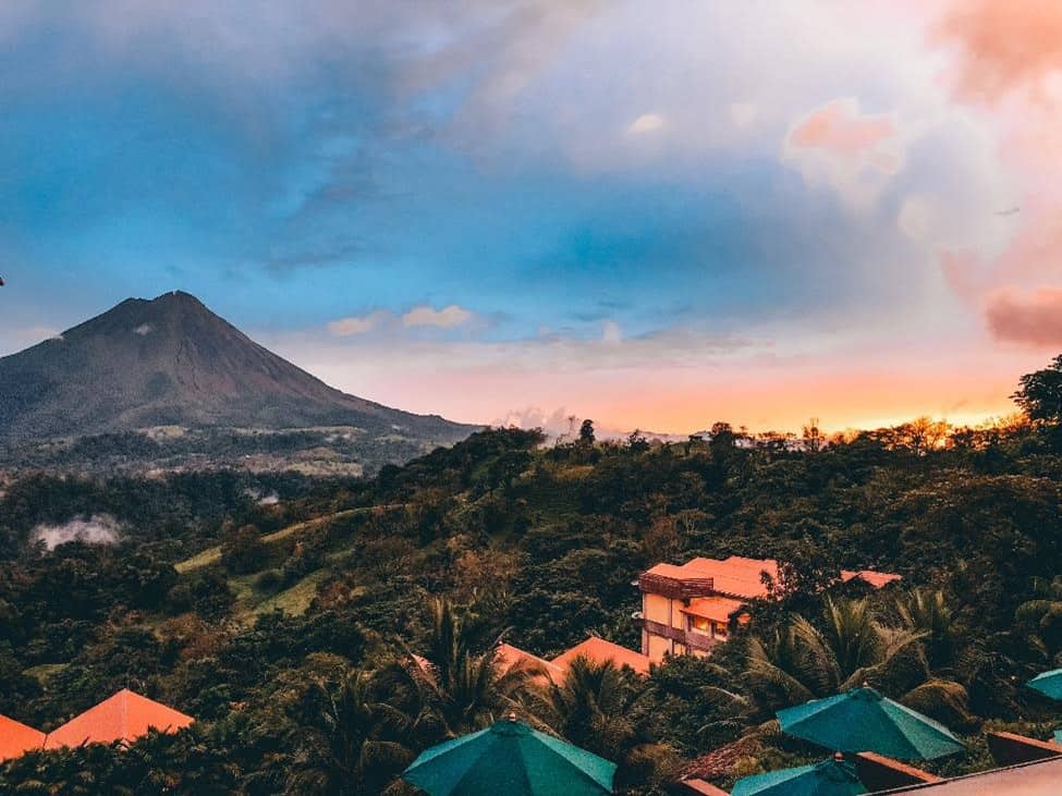 Sunset view of the jungle and volcano
