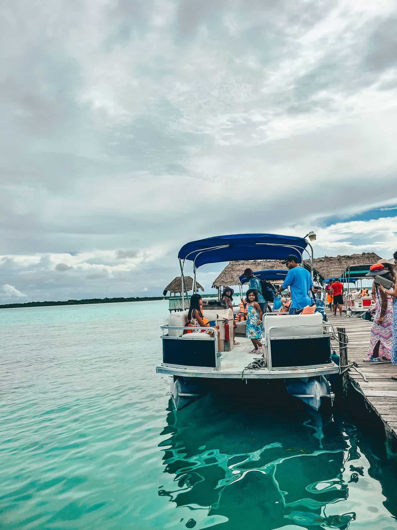 Boat at dock for tour of Bacalar Lagoon in Mexico