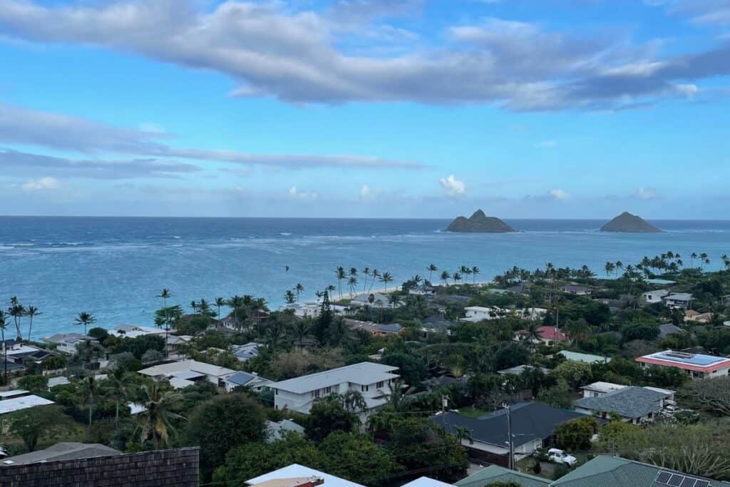 View of Lanikai beach and the coastal town from a hike in the jungle