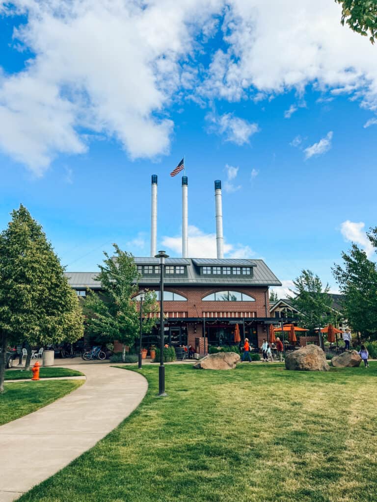 View of the Old Mill District in Bend, with the smokestacks in the background