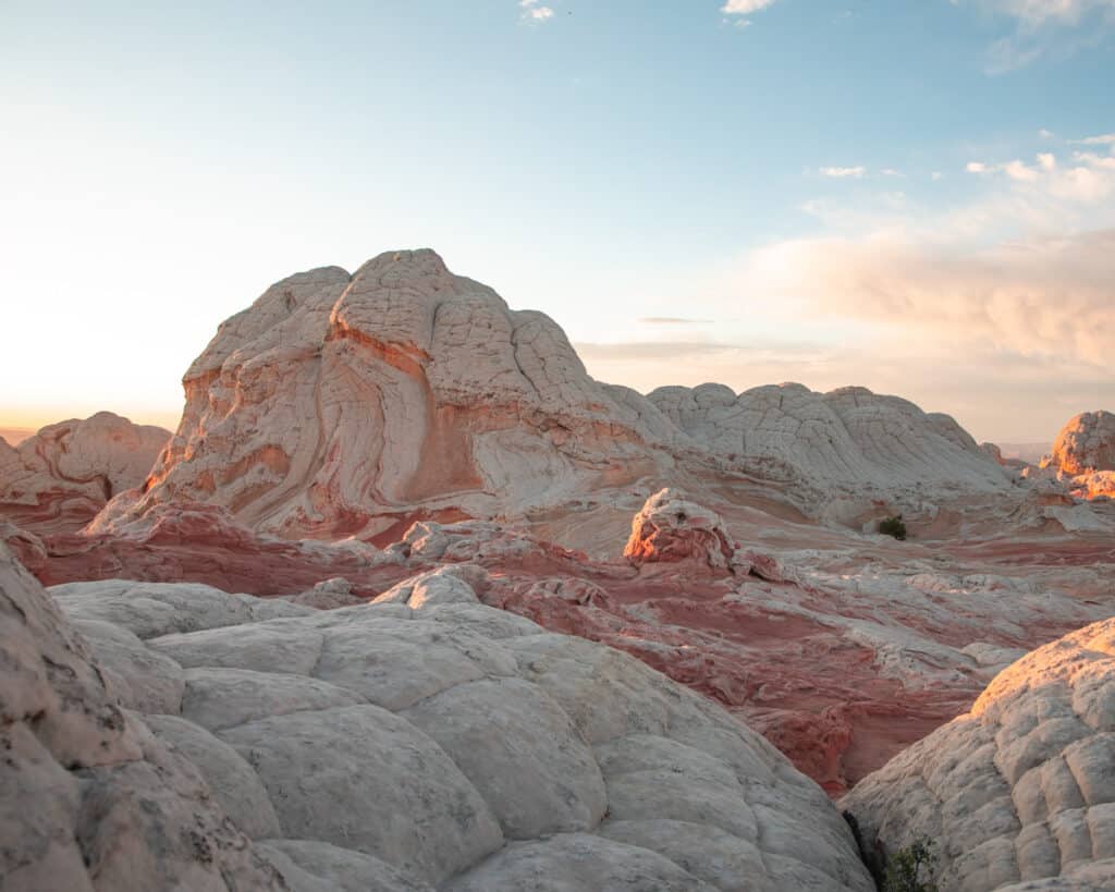 Sunrise over light pink rocks in White Pocket arizona