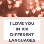 graphic image featuring the phrase 'I LOVE YOU IN 100 DIFFERENT LANGUAGES' for travelers, set against a bokeh background with heart-shaped lights.