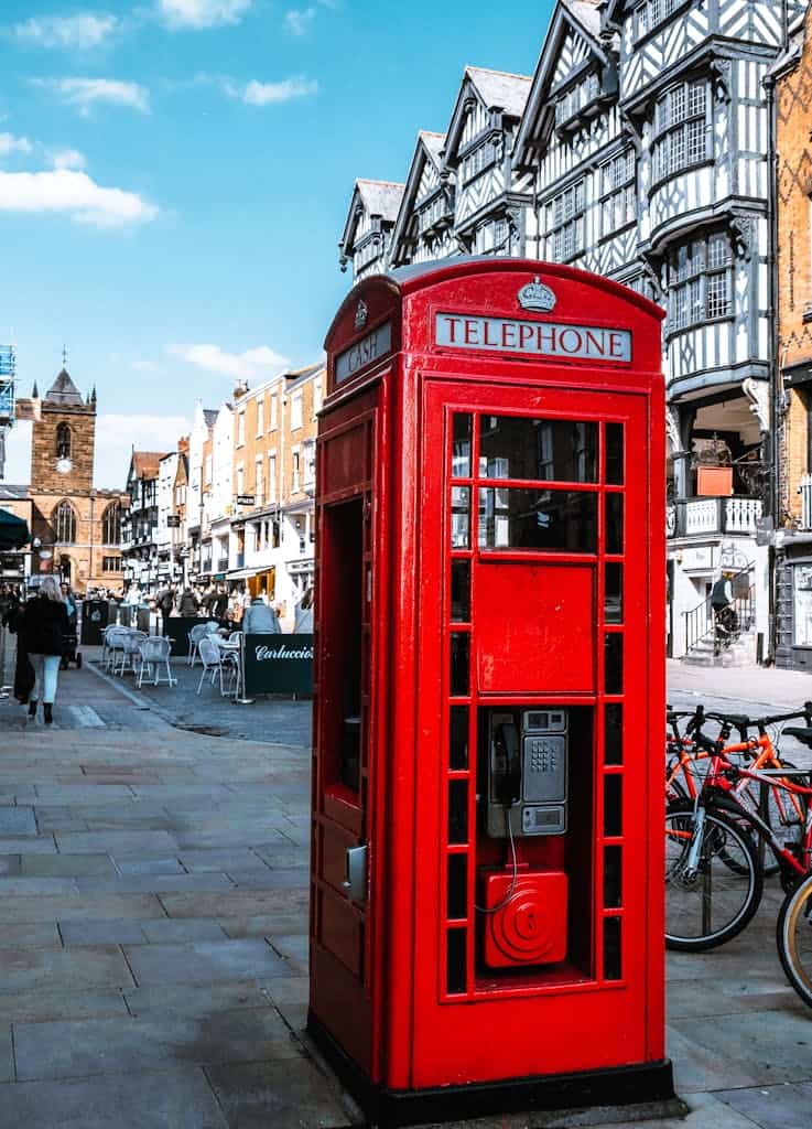 Selective Focus Photography Of Red Telephone Booth